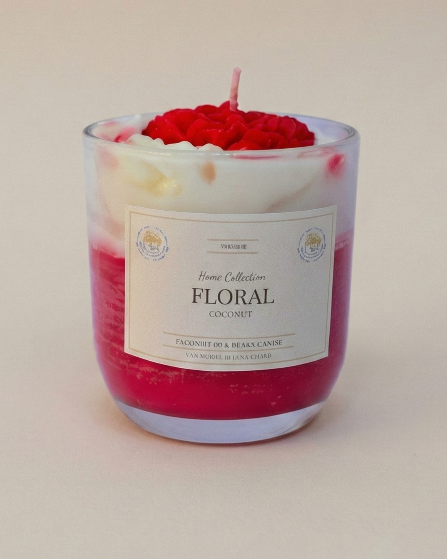 Hand poured Lunis candle with red heart-shaped wax top, layered white and crimson coconut floral wax in a glass jar.