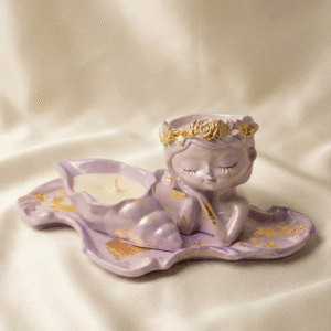 Handcrafted lavender purple concrete candle set featuring a wavy dish and two separate candle holders, all with irregular gold leaf accents.
